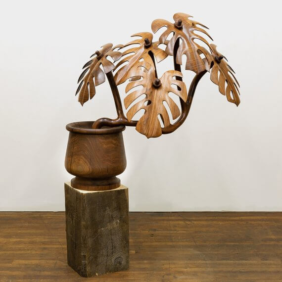 Raul De Lara Familia, 2024 walnut, polyx-wax, polyurethane 40 x 41 x 26 in. (101.6 x 104.1 x 66 cm.)