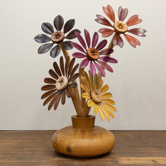 Raul De Lara Mis Flores / My Flowers, 2026 Bolivian rosewood, wenge, padauk, purpleheart, yellow Rosa, maple, oak, cherry, African mahogany, walnut, ash, polyx-wax 69 x 54 x 34 in. (175.3 x 137.2 x 86.4 cm.)
